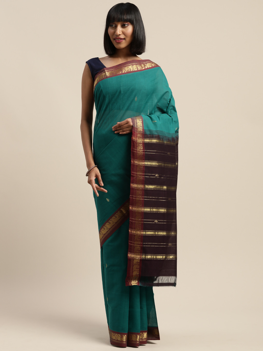

APCO Teal Green & Gold-Toned Pure Cotton Woven Design Sustainable Saree