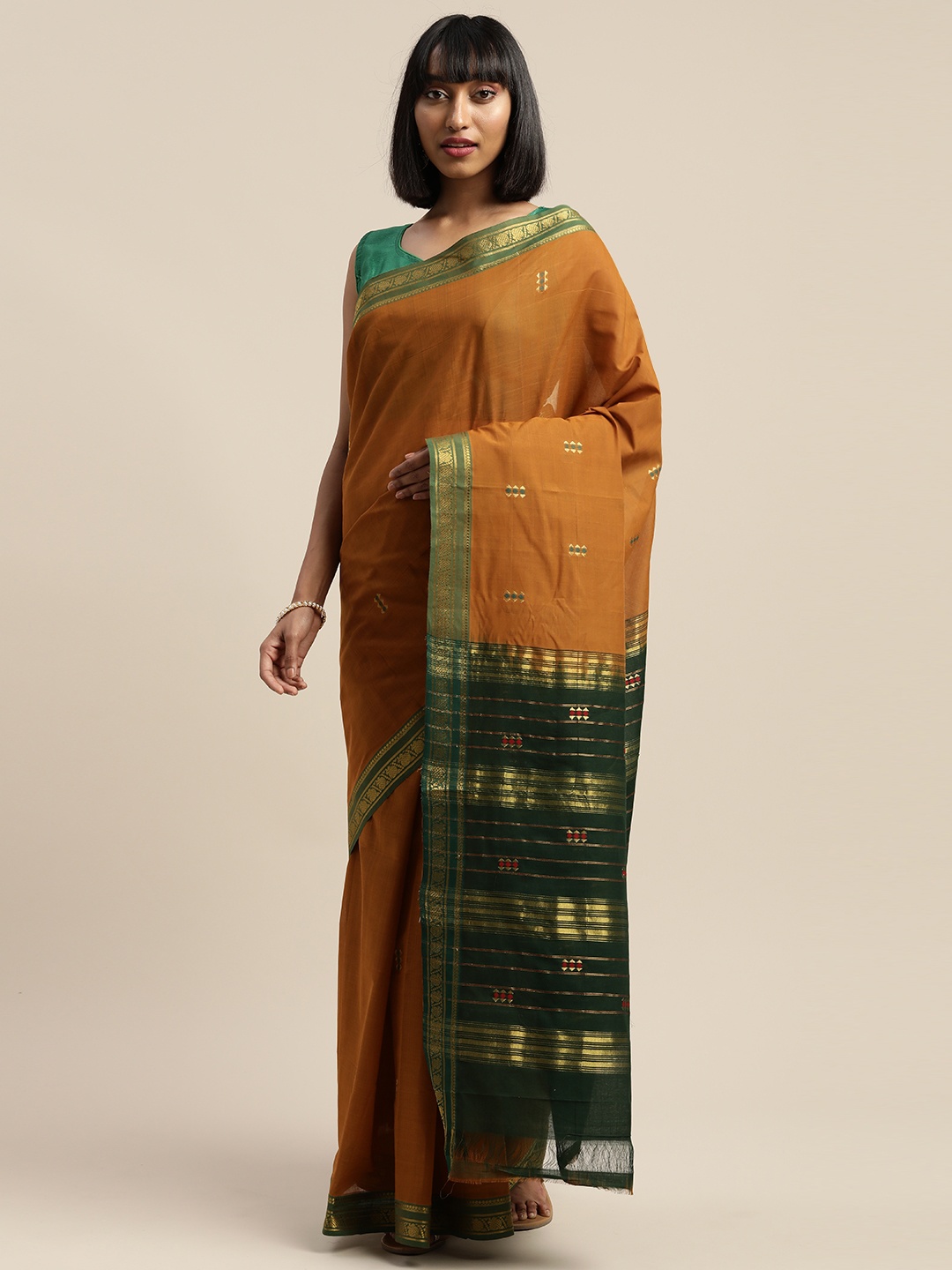 

APCO Brown & Green Pure Cotton Woven Design Sustainable Saree