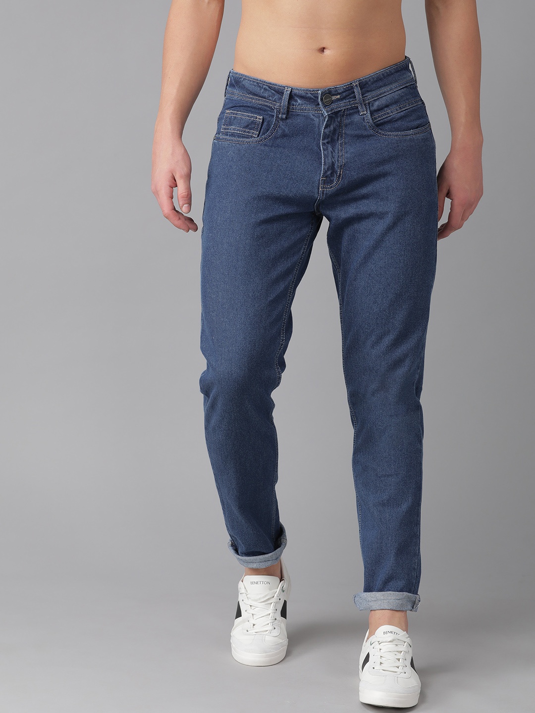 

The Roadster Lifestyle Co Men Navy Blue Slim Tapered Fit Mid-Rise Clean Look Stretchable Jeans