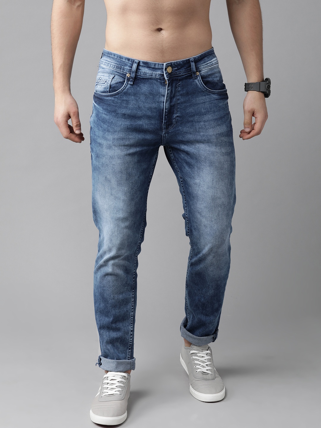 

The Roadster Lifestyle Co Men Navy Blue Slim Fit Mid-Rise Heavy Fade Stretchable Jeans