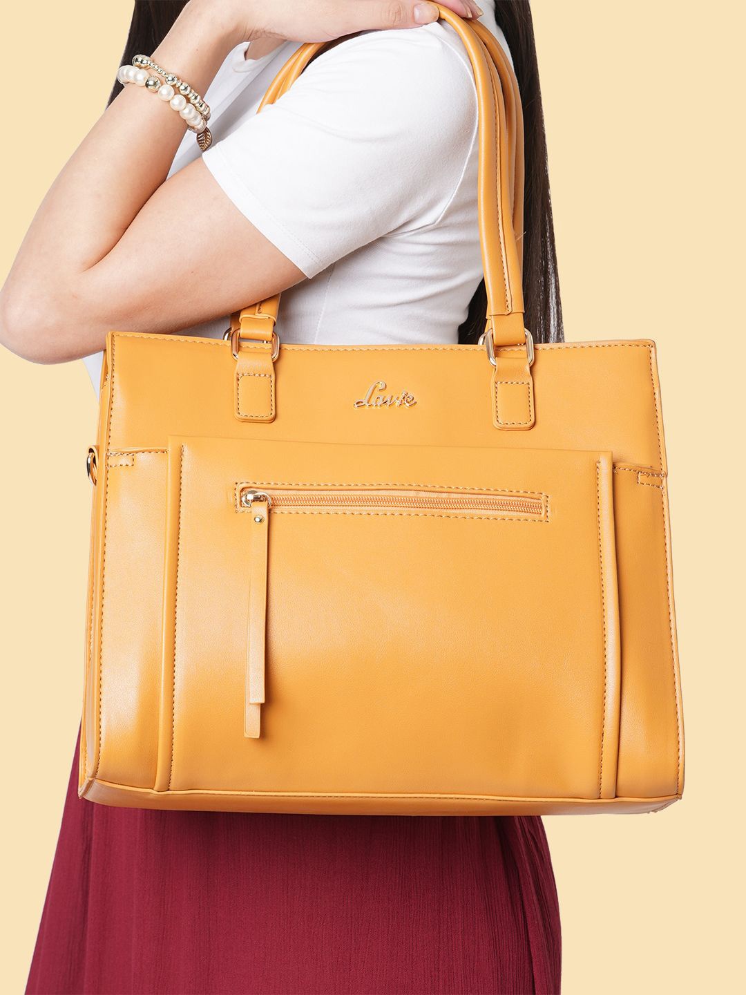 

Lavie Fair Mustard Yellow Solid Structured Handheld Bag