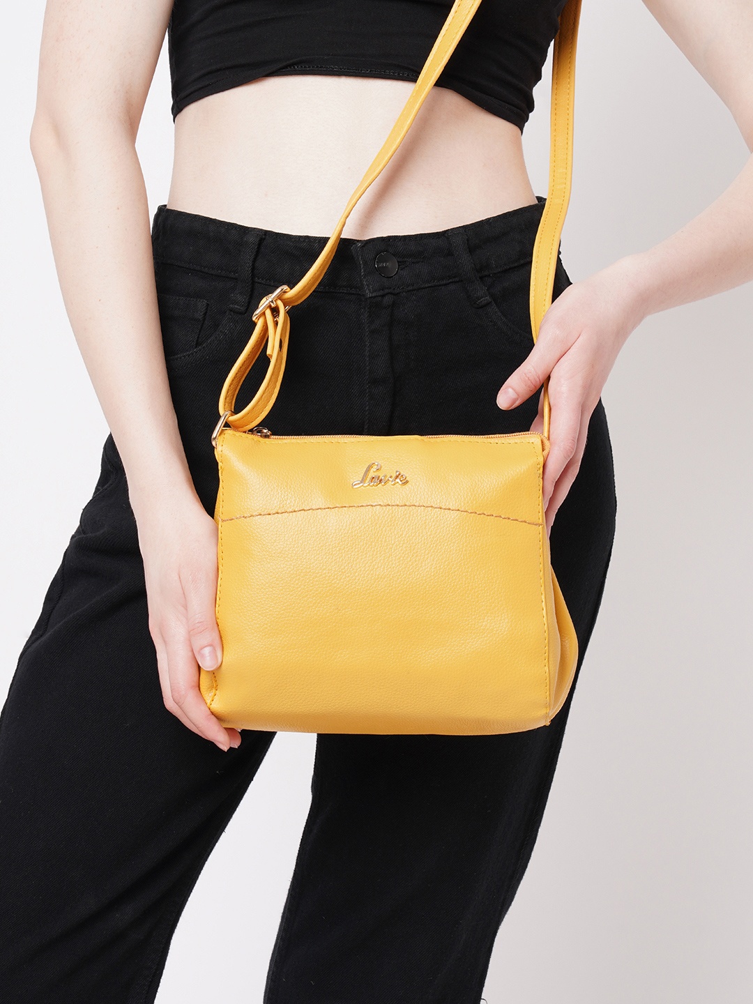 

Lavie Solid PU Regular Structured Sling Bag, Yellow