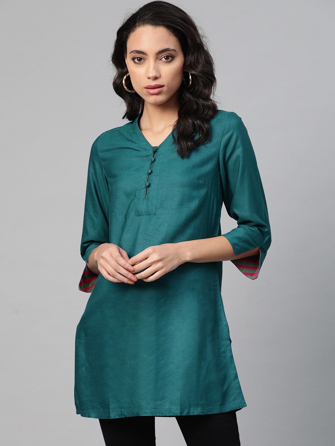 

Fabindia Women Teal Solid Tunic