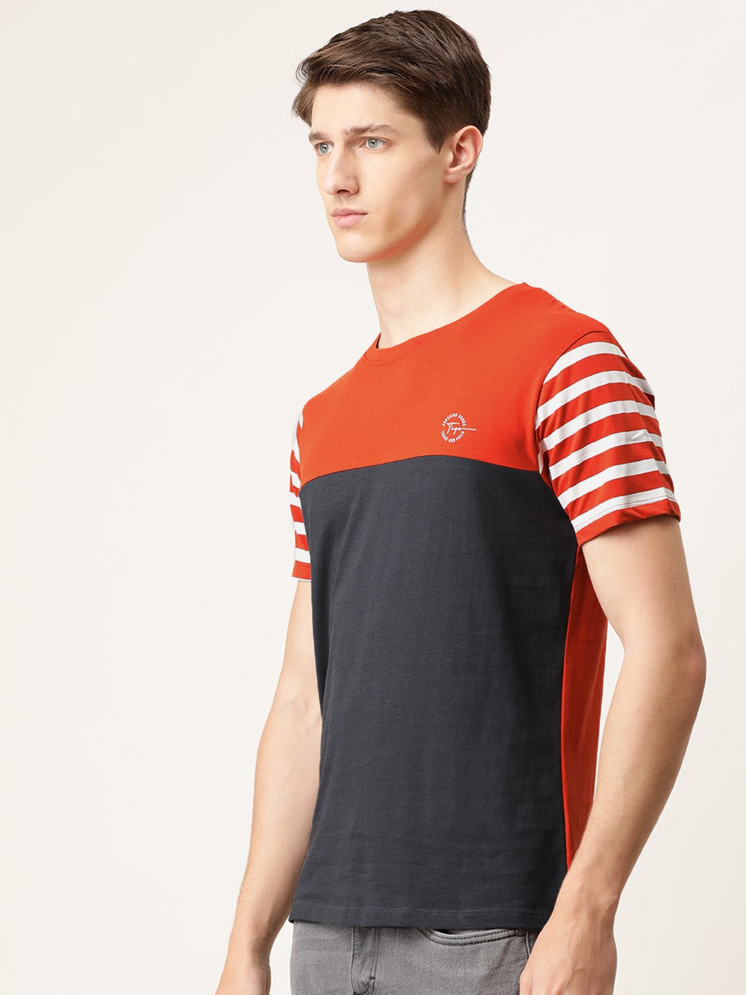

The Indian Garage Co Men Charcoal Grey & Orange Colourblocked Round Neck T-shirt