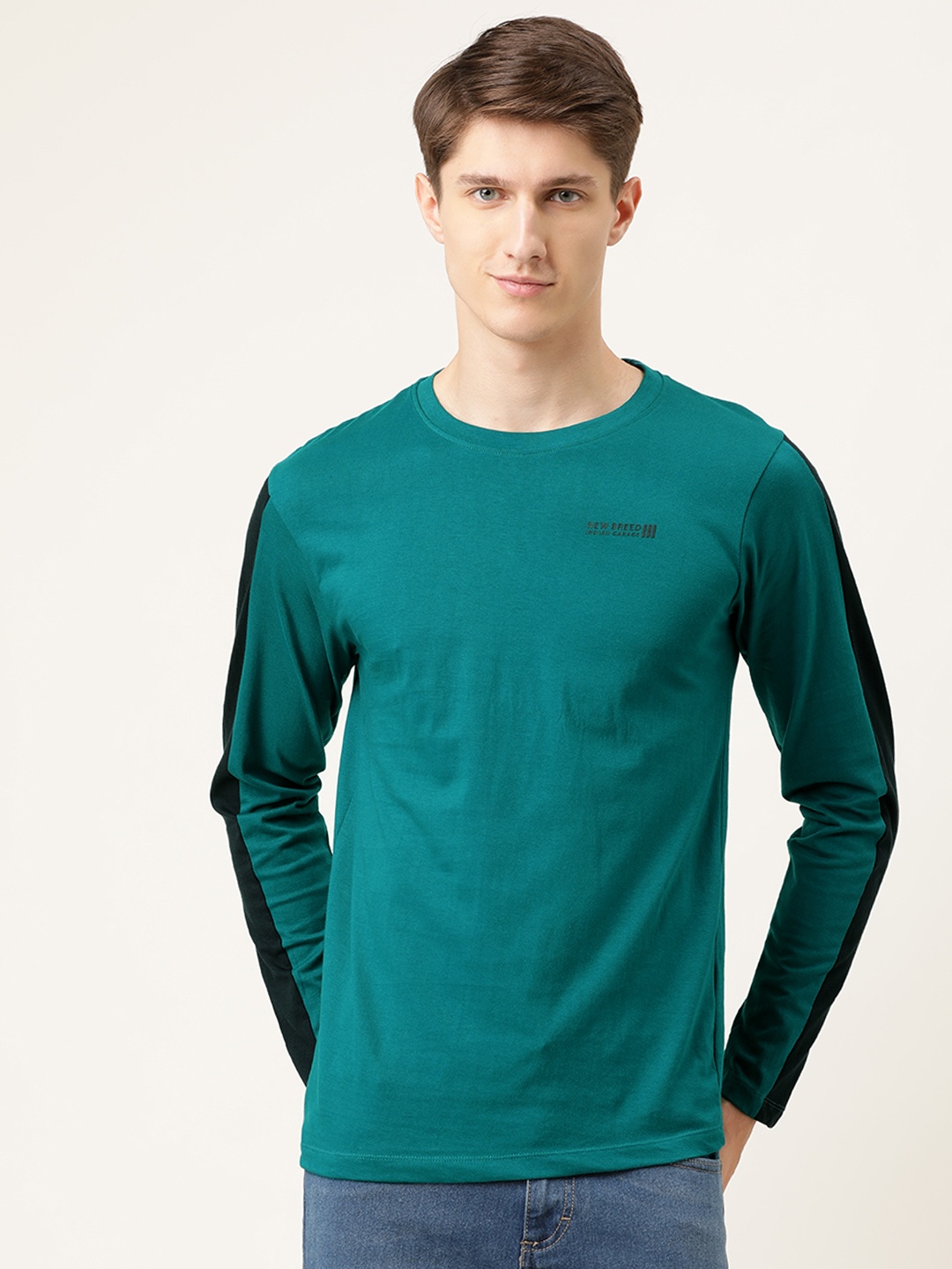 

The Indian Garage Co Men Teal Blue Solid Round Neck Pure Cotton T-shirt