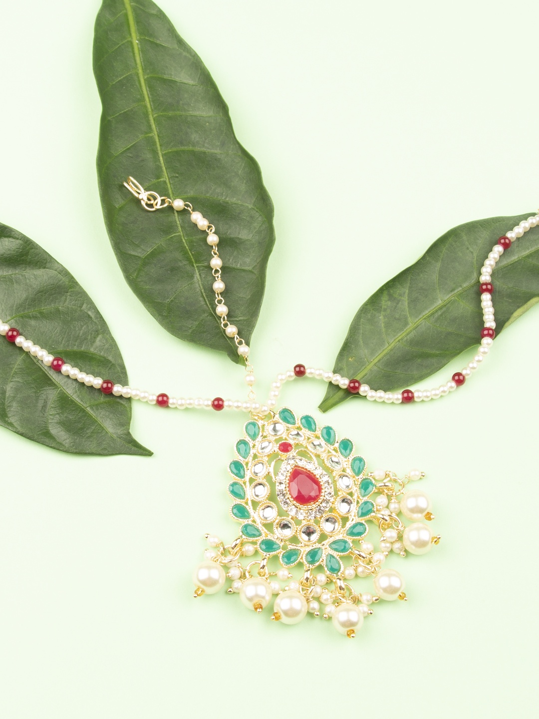 

AccessHer Gold Plated & Green Embellished Mathapatti