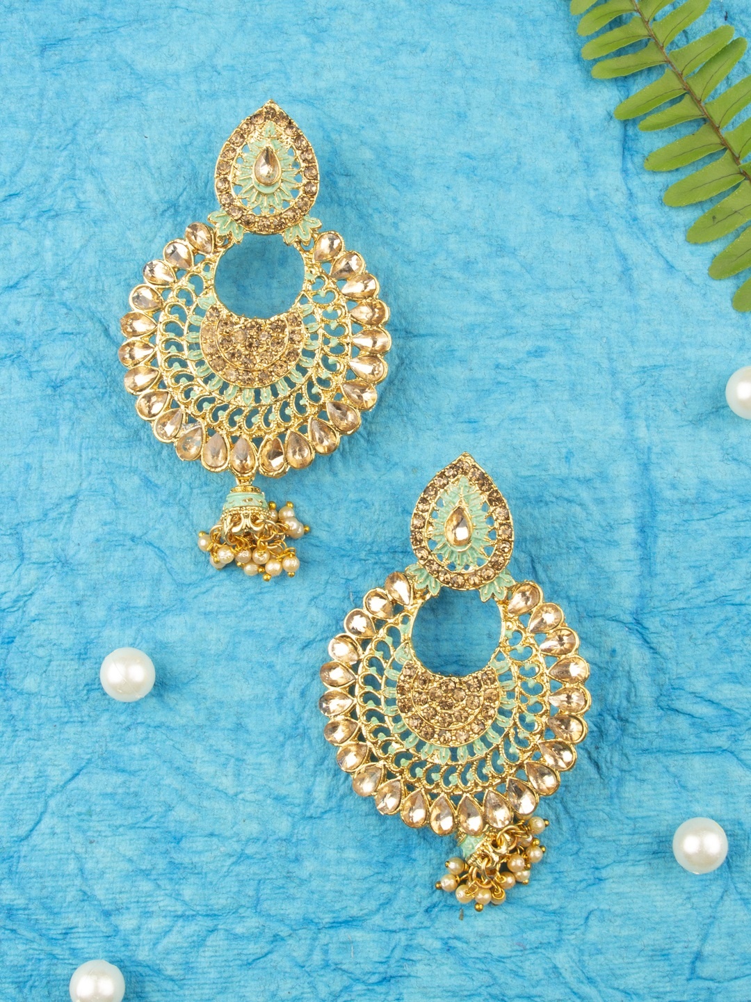 

AccessHer Gold-Toned & Green Brass-Plated Kundan Enamelled Crescent Shaped Chandbalis