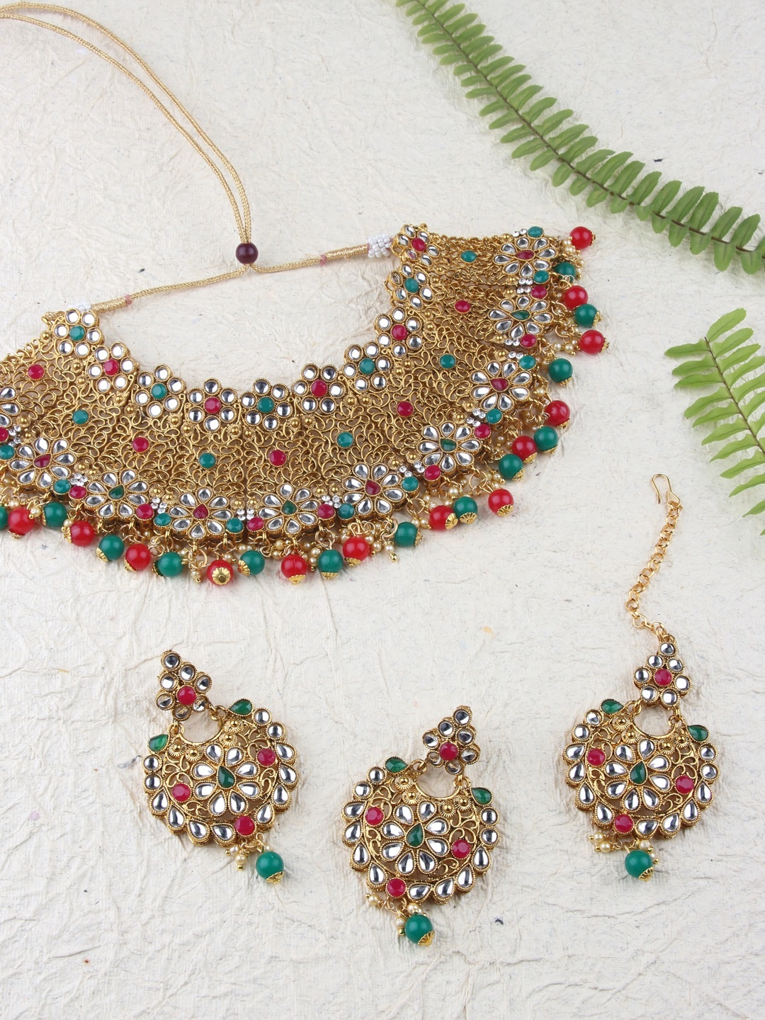 

AccessHer Brass-Plated Gold-Toned & Red Kundan Studded Jadau Choker Jewellery Set