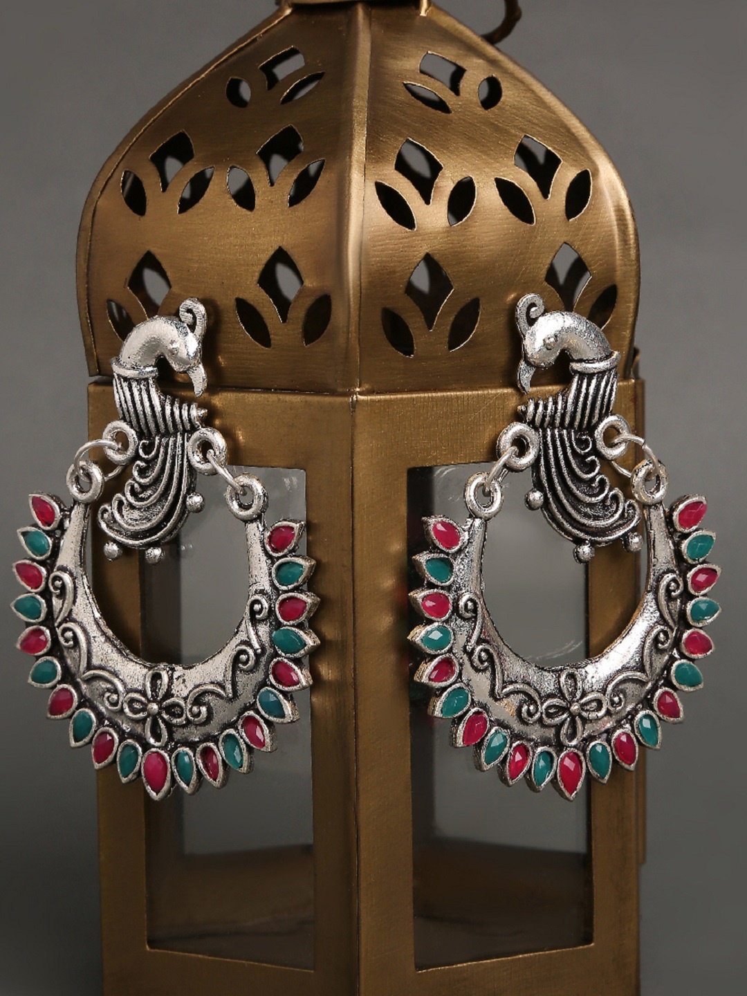 

OOMPH Green Silver-Plated Peacock Shaped Chandbalis