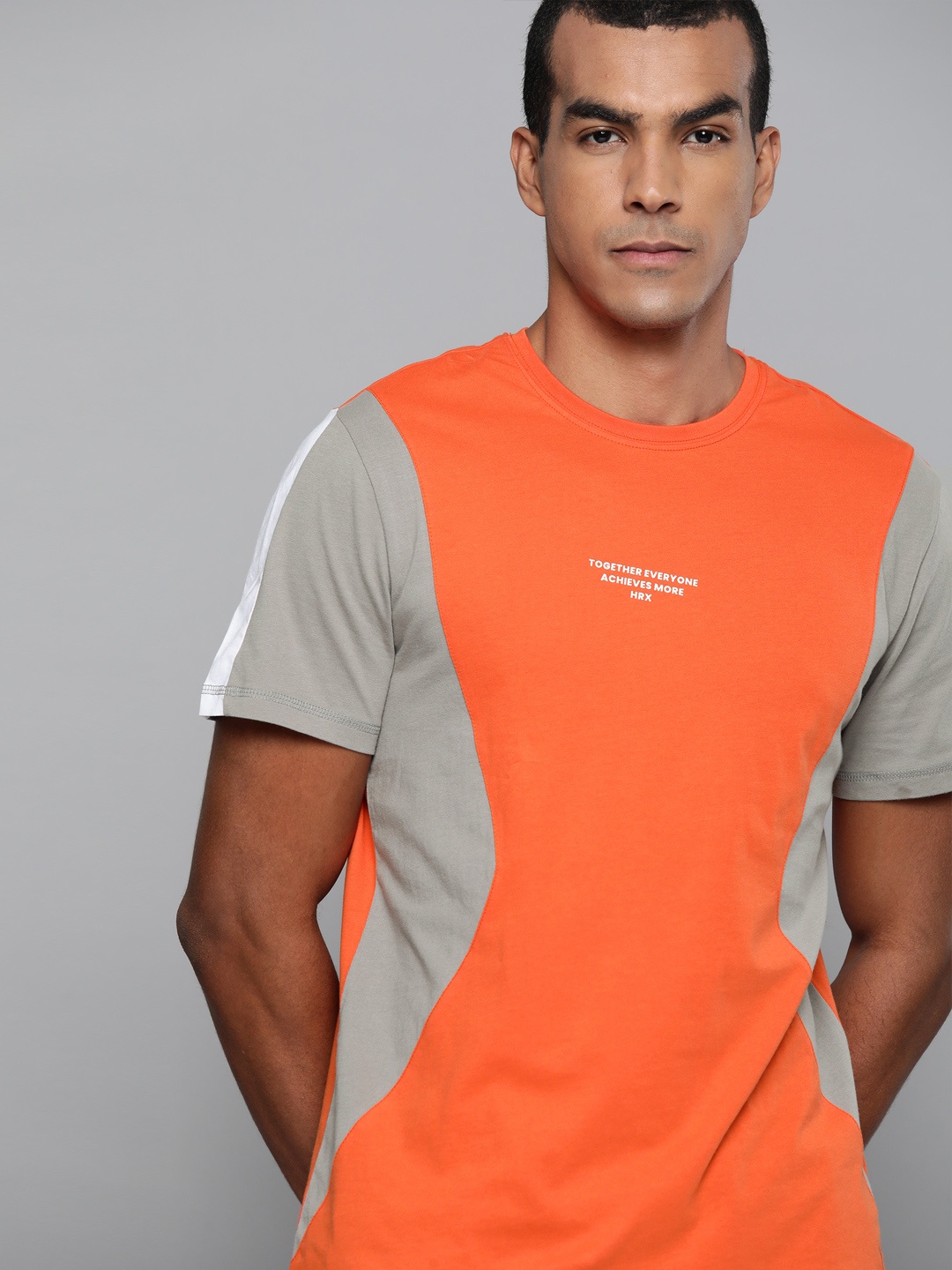 

HRX By Hrithik Roshan Men Orangeade , Optic White , Wet Weather Colourblock Bio-Wash Lifestyle Tshirt, Orange
