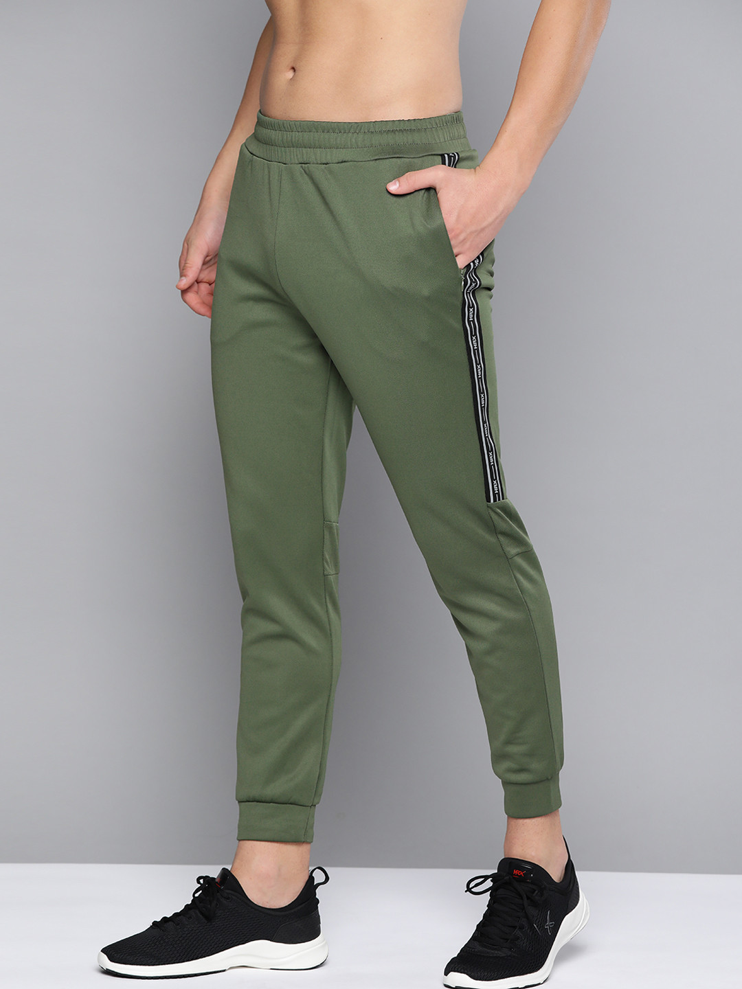 

HRX By Hrithik Roshan Men Black Forest Solid Slim Fit Antimicrobial Running Joggers, Green