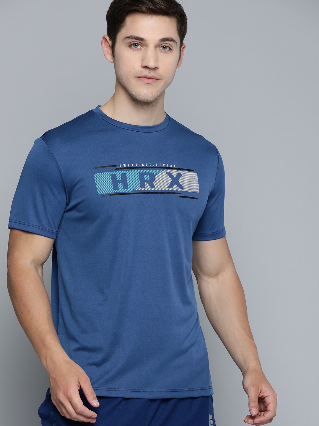 

HRX By Hrithik Roshan Men Mazarine Blue Typographic Rapid-Dry Antimicrobial Training Tshirt