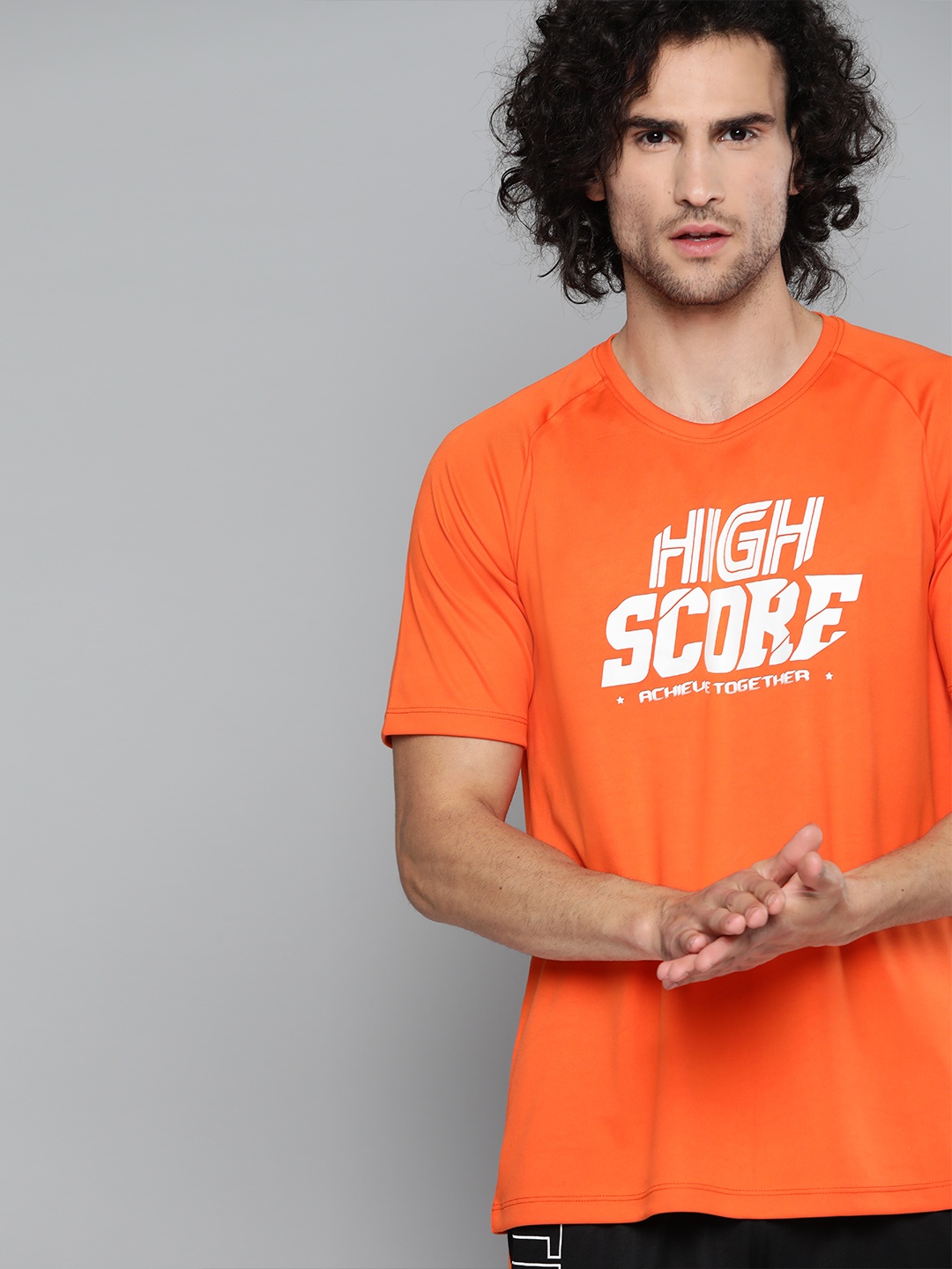 

HRX By Hrithik Roshan Men Orangeade Graphic Rapid-Dry Football Tshirt, Orange