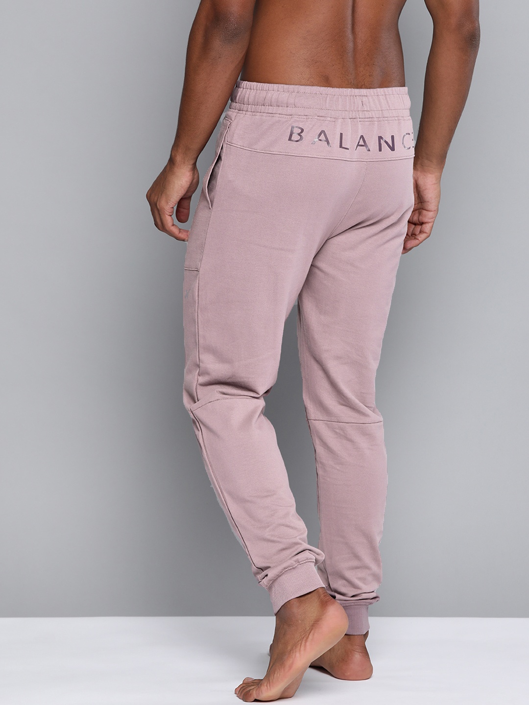 

HRX By Hrithik Roshan Men Twilight Mauve Typographic Regular Fit Organic Cotton Antimicrobial Yoga Joggers