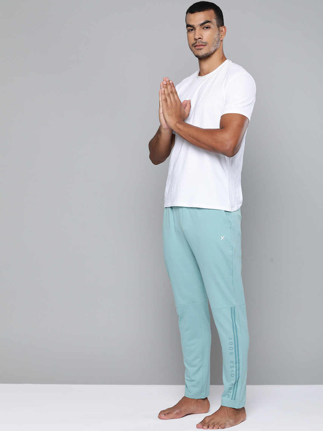 

HRX By Hrithik Roshan Men Blue Typographic Slim Fit Cotton Antimicrobial Yoga Track Pants