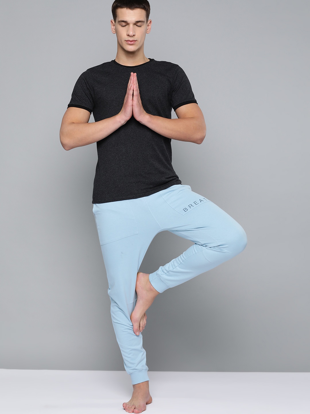 

HRX By Hrithik Roshan Men Good Grey Typographic Slim Fit Organic Cotton Antimicrobial Yoga Sustainable Joggers, Blue