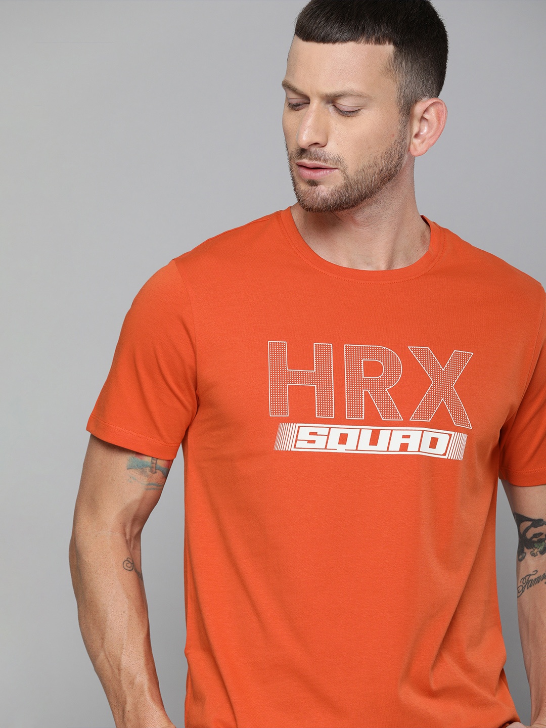 

HRX By Hrithik Roshan Men Orangeade Solid Bio-Wash Lifestyle Tshirt, Orange