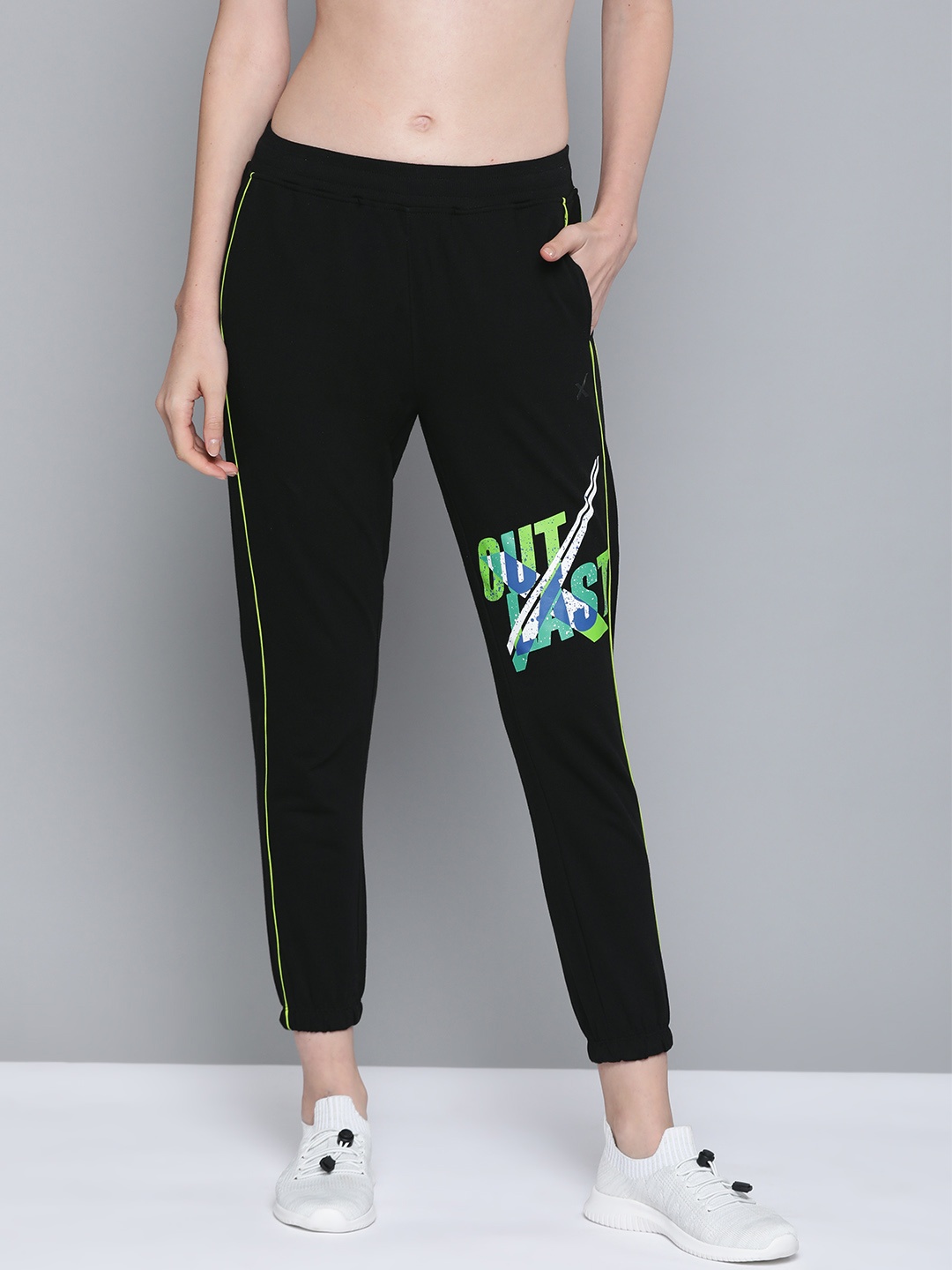 

HRX By Hrithik Roshan Women Jet Black Solid Slim Fit Mid-Rise Bio-Wash Lifestyle Joggers