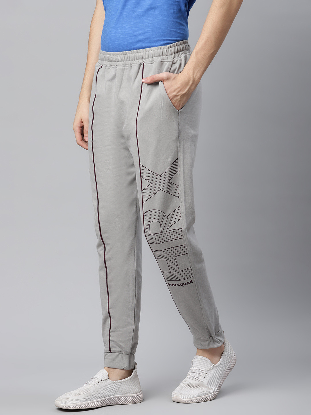 

HRX By Hrithik Roshan Men Grey Printed Regular Fit Mid-Rise Bio-Wash Lifestyle Joggers