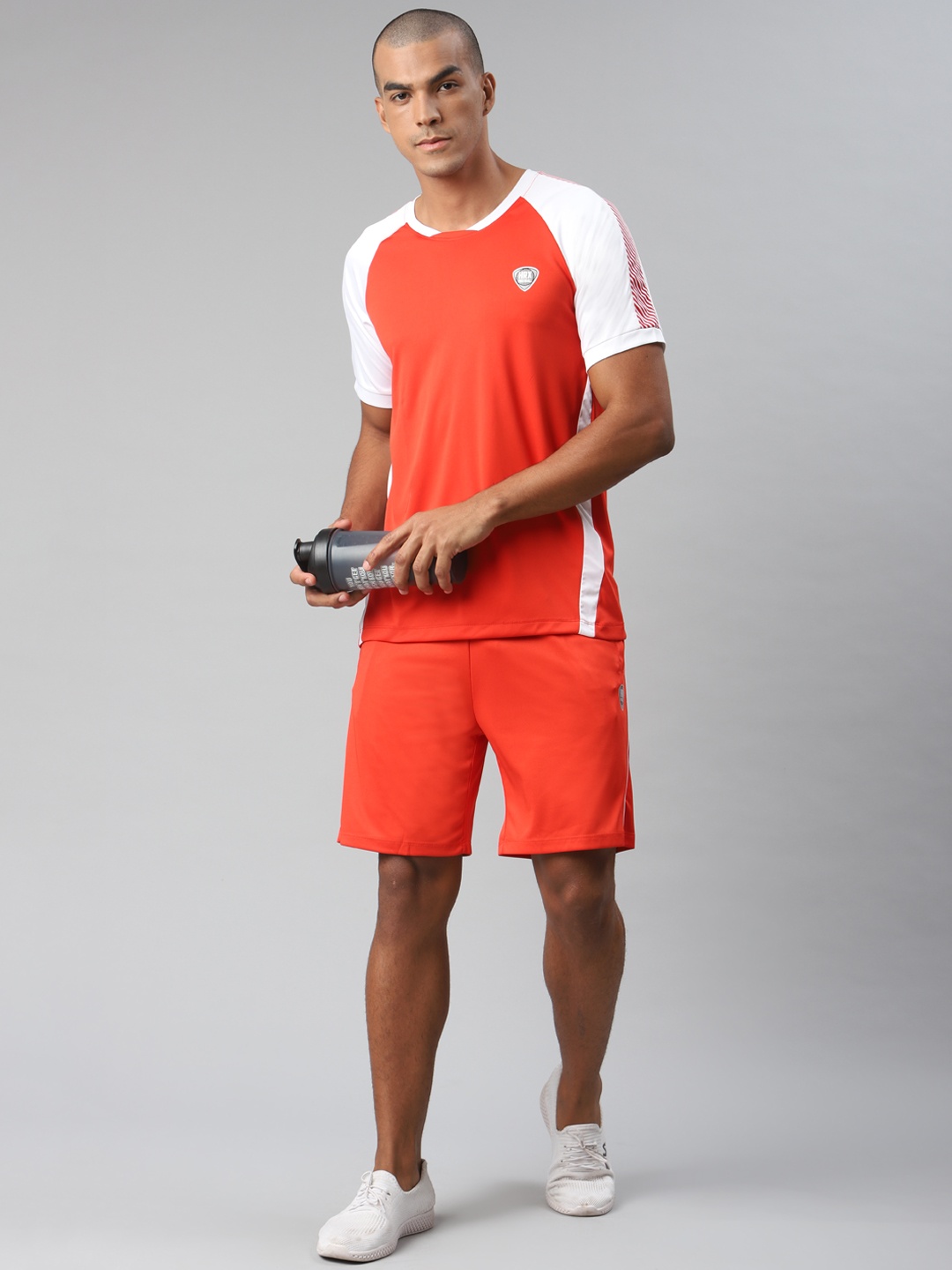 

HRX By Hrithik Roshan Men High Risk Red Typographic Regular Fit Mid-Rise Rapid-Dry Football Shorts, Maroon