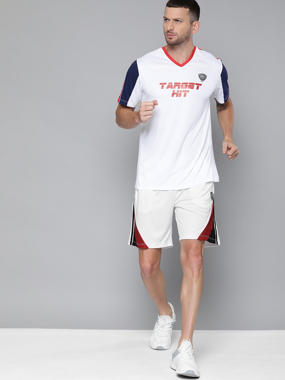 

HRX By Hrithik Roshan Men Optic White Colourblock Regular Fit Mid-Rise Rapid-Dry Football Shorts