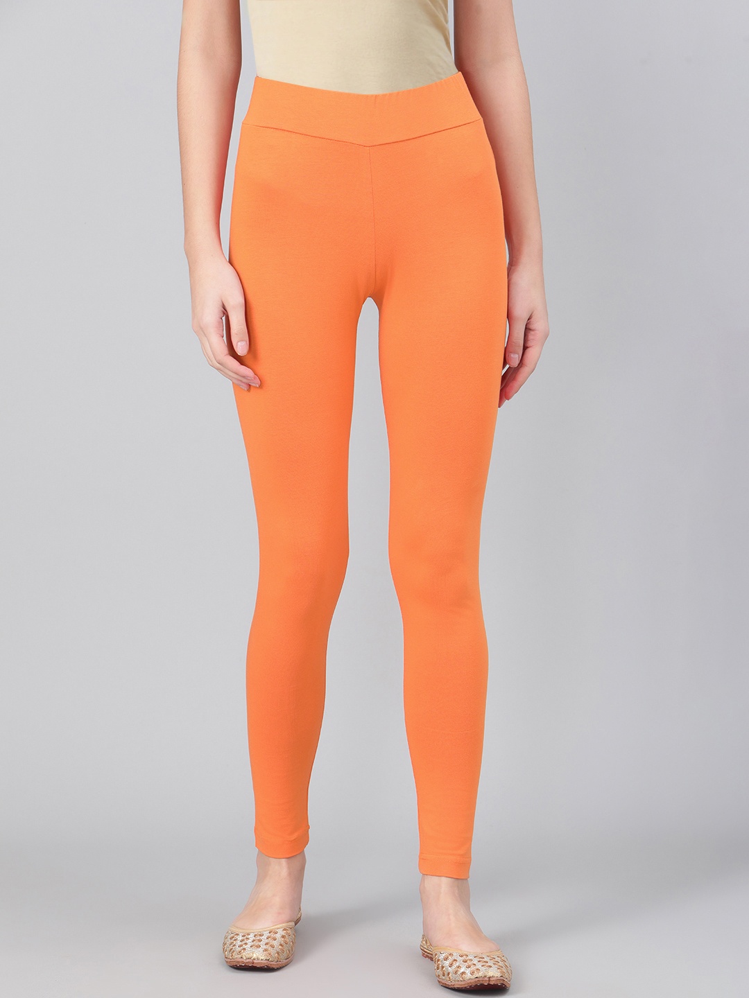 

Biba Women Orange Solid Ankle-Length Leggings