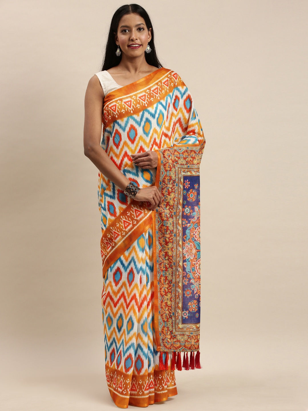

VASTRANAND White & Orange Linen Blend Printed Ikat Saree