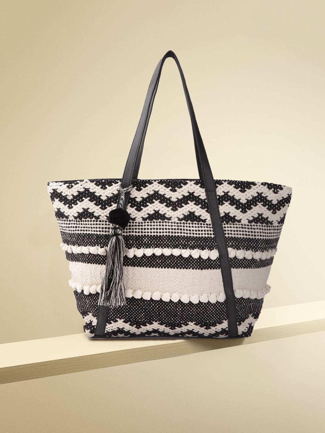 

Anouk Women Black & Off-White Woven Design Shoulder Bag