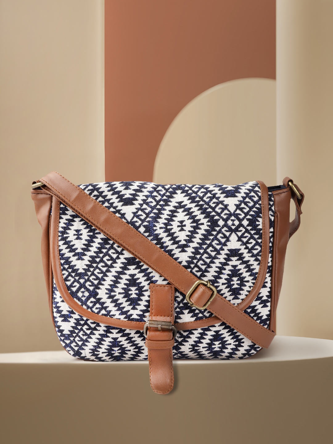 

Anouk Women Navy Blue & White Self Design Sling Bag