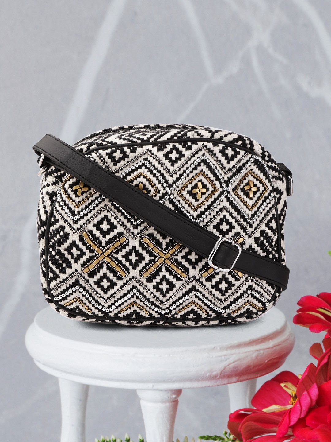 

Anouk Women Black & Off-White Woven Design & Embellished Sling Bag