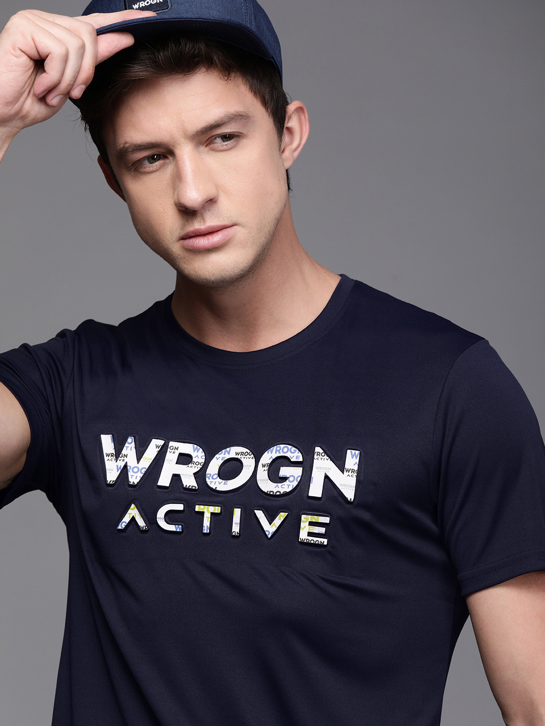 

WROGN ACTIVE Men Navy Blue & White Self-designed Round Neck T-shirt