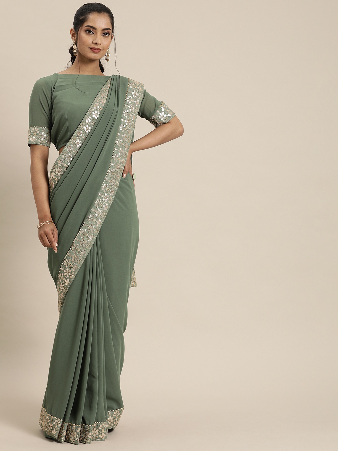 

Inddus Green Solid Saree