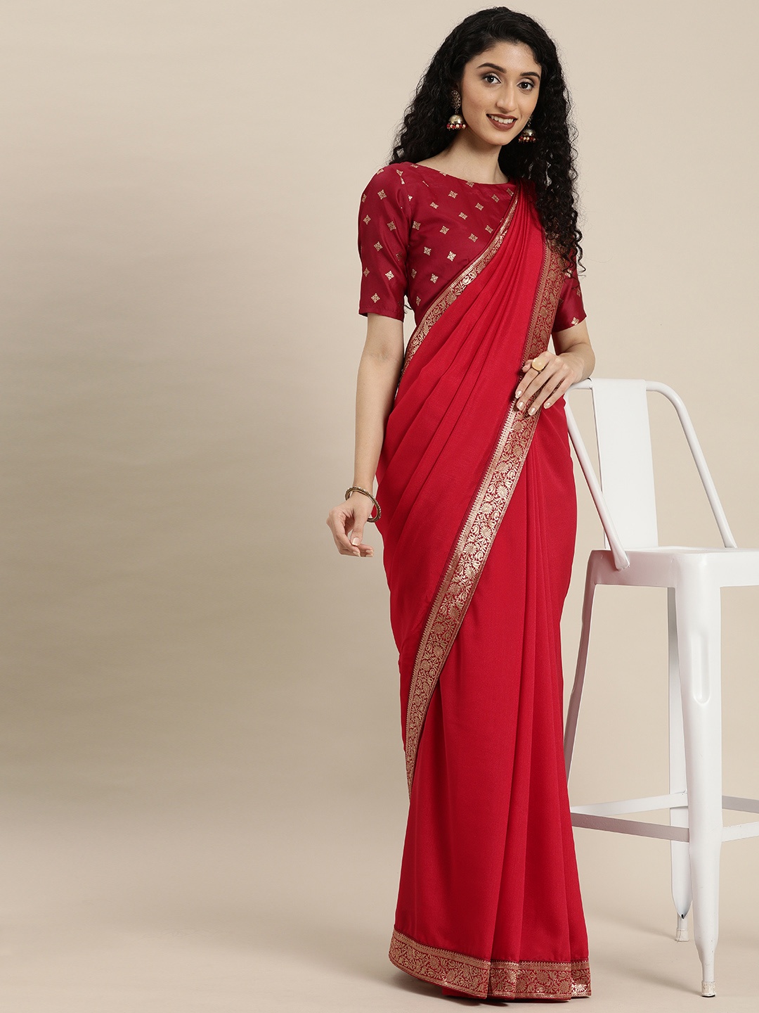 

Inddus Red Solid Silk Blend Saree