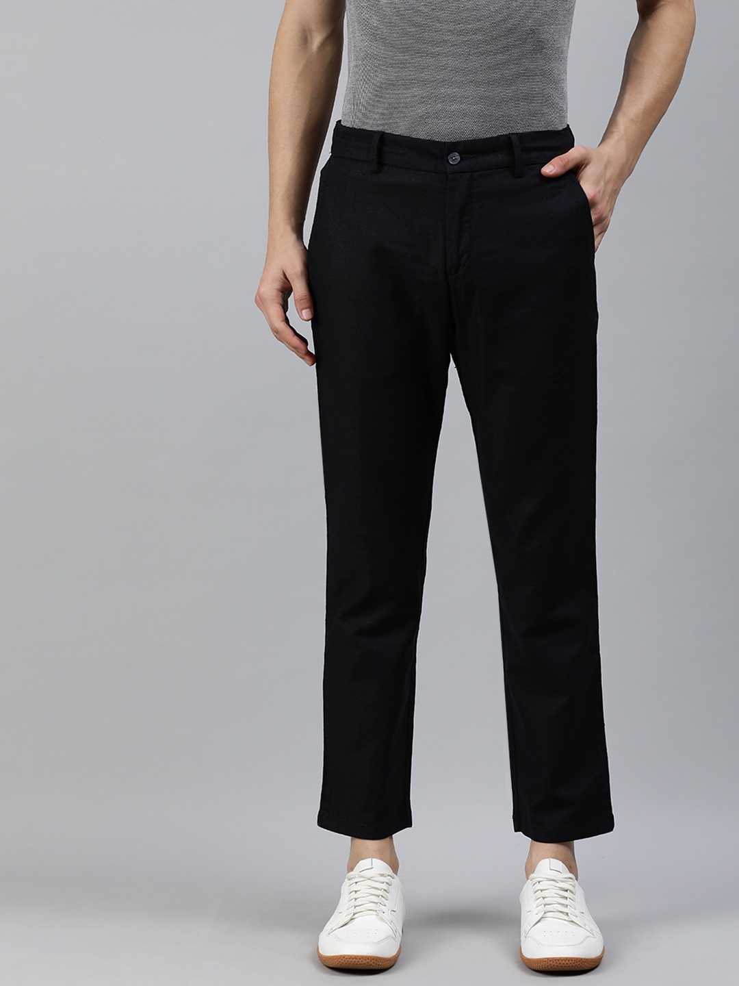 

Arrow New York Men Black Tapered Fit Solid Regular Trousers