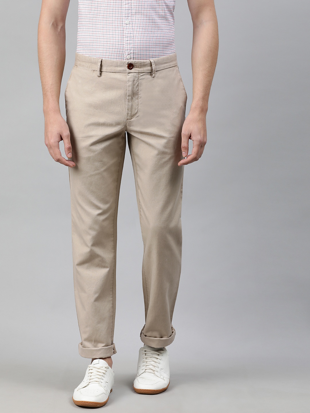 

Tommy Hilfiger Men Beige Regular Fit Solid Regular Trousers