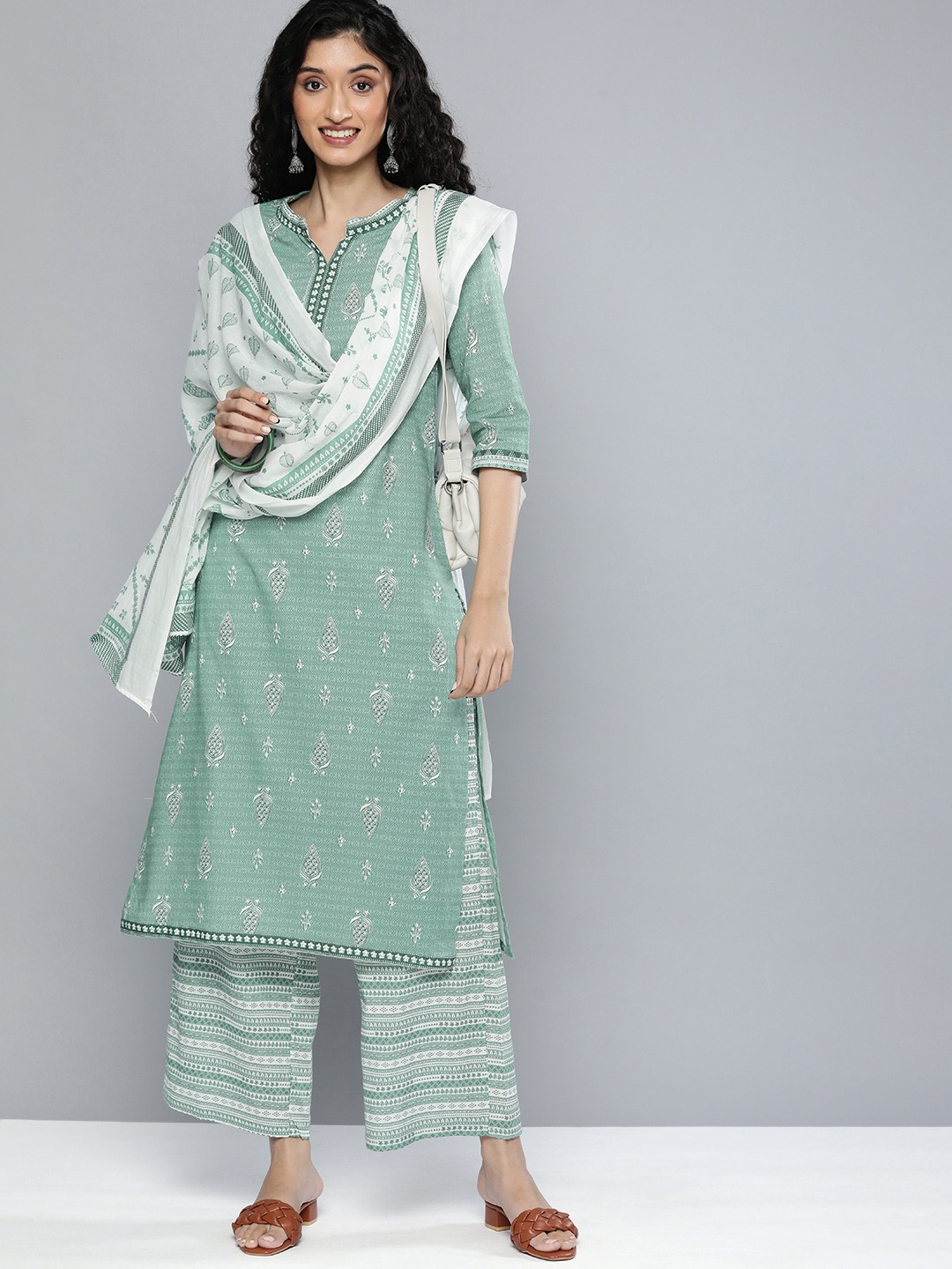 

Vishudh Women Green Printed Kurta with Trousers & Dupatta