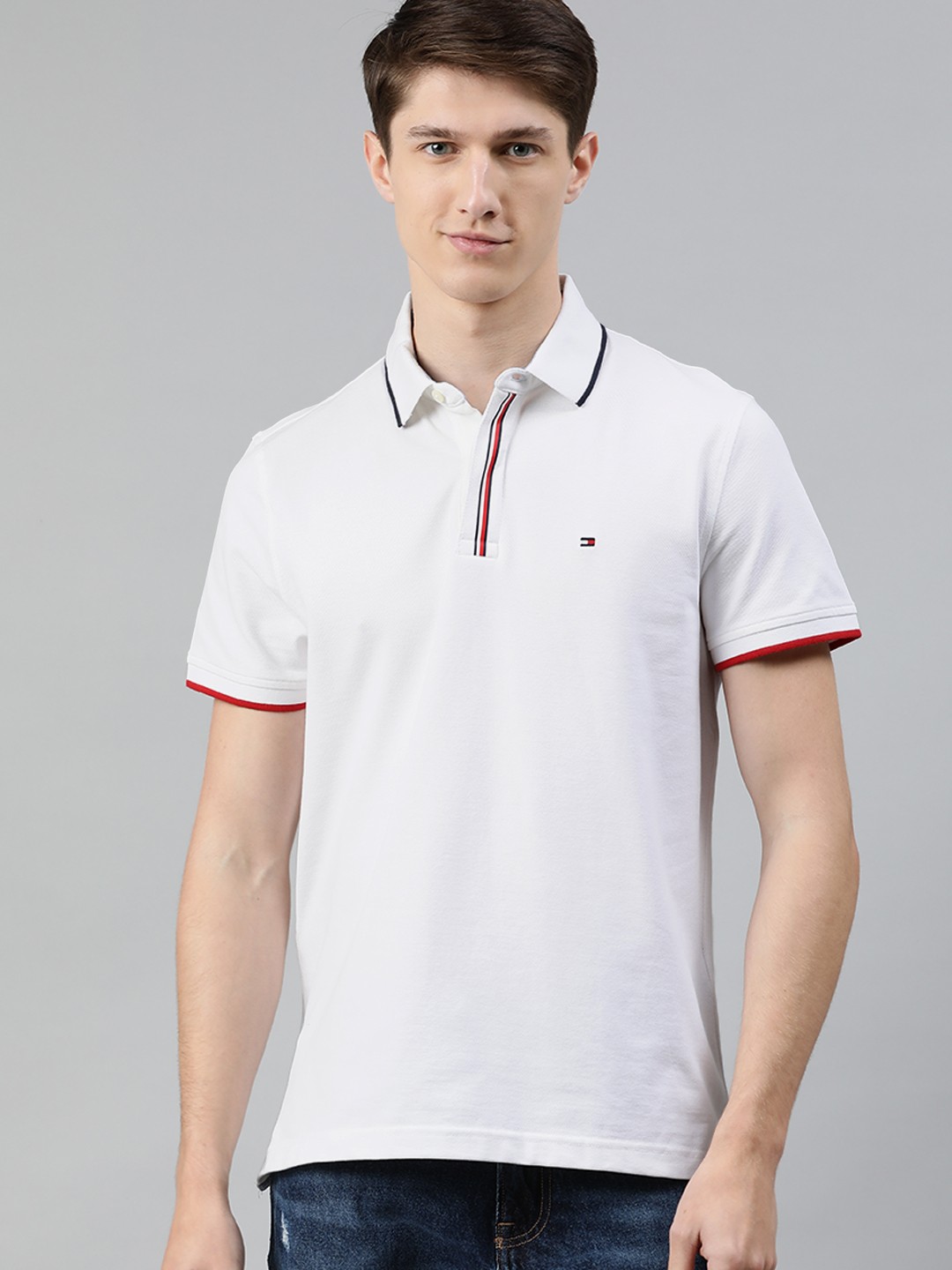 

Tommy Hilfiger Men White Solid Polo Collar T-shirt