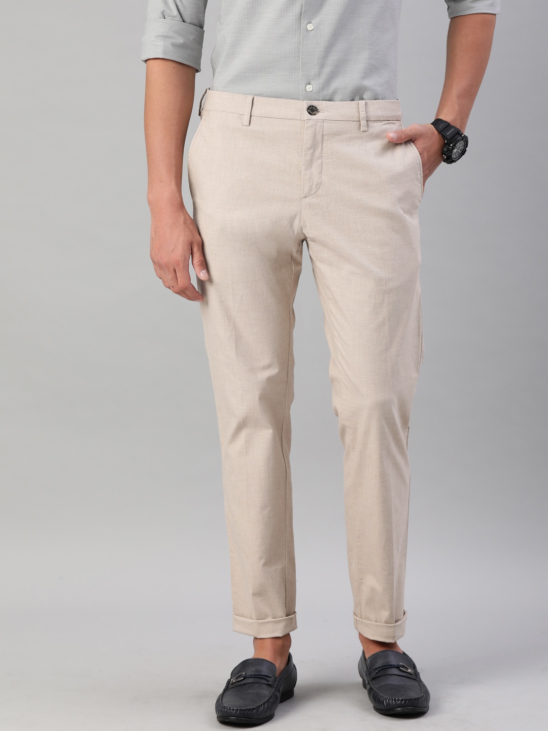 

Tommy Hilfiger Men Beige Slim Fit Flex Solid Smart Casual Trousers