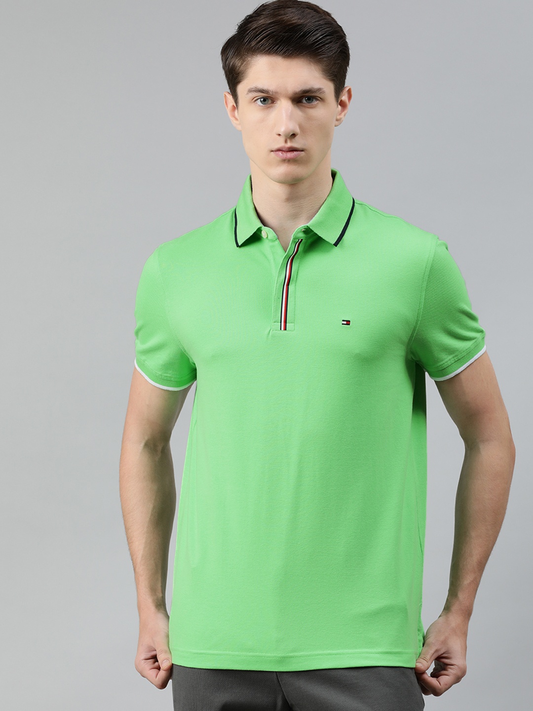 

Tommy Hilfiger Men Green Solid Polo Collar T-shirt