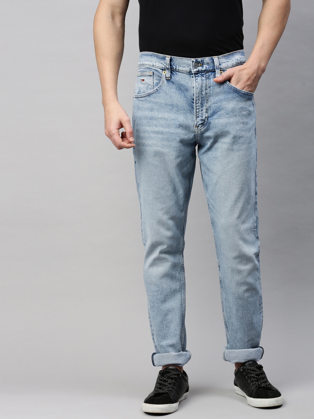 

Tommy Hilfiger Men Blue Modern Tapered Fit Mid-Rise Clean Look Jeans