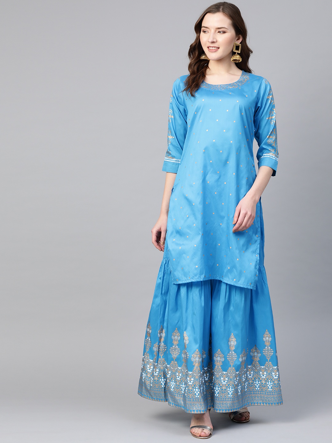 

Bhama Couture Women Blue & Golden Block Print Kurta with Sharara