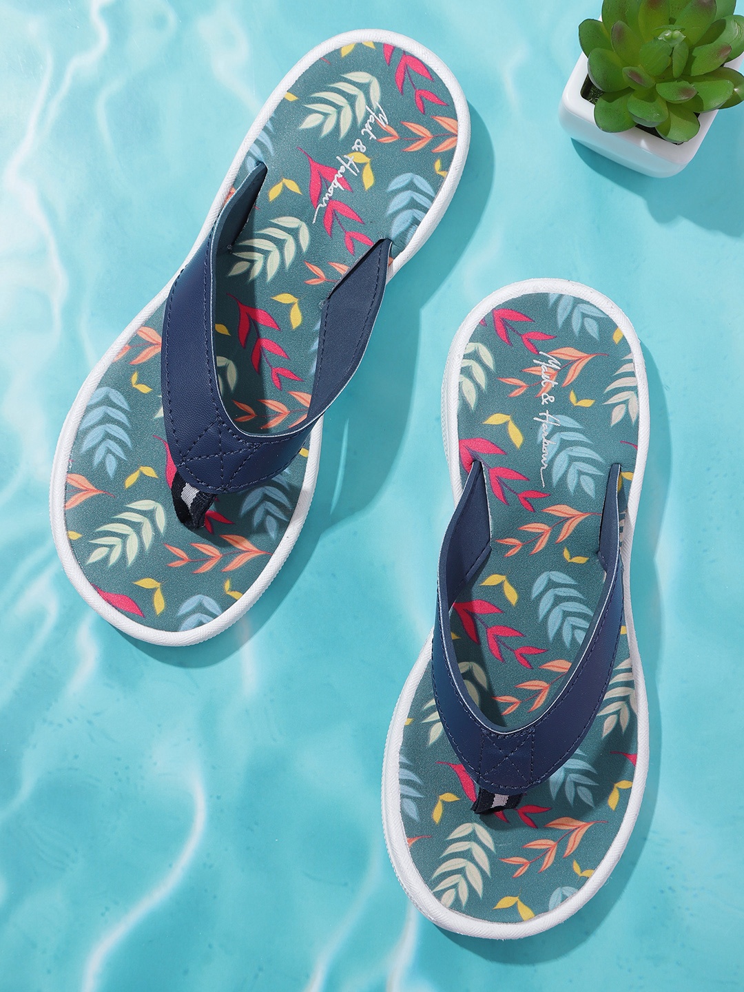 

Mast & Harbour Women Navy Blue & Pink Leaf Print Thong Flip-Flops