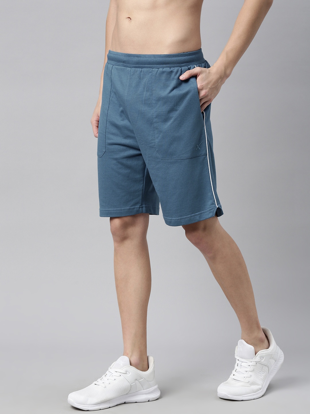 

HRX By Hrithik Roshan Men Blue Solid Regular Fit Mid-Rise Bio-Wash Lifestyle Shorts