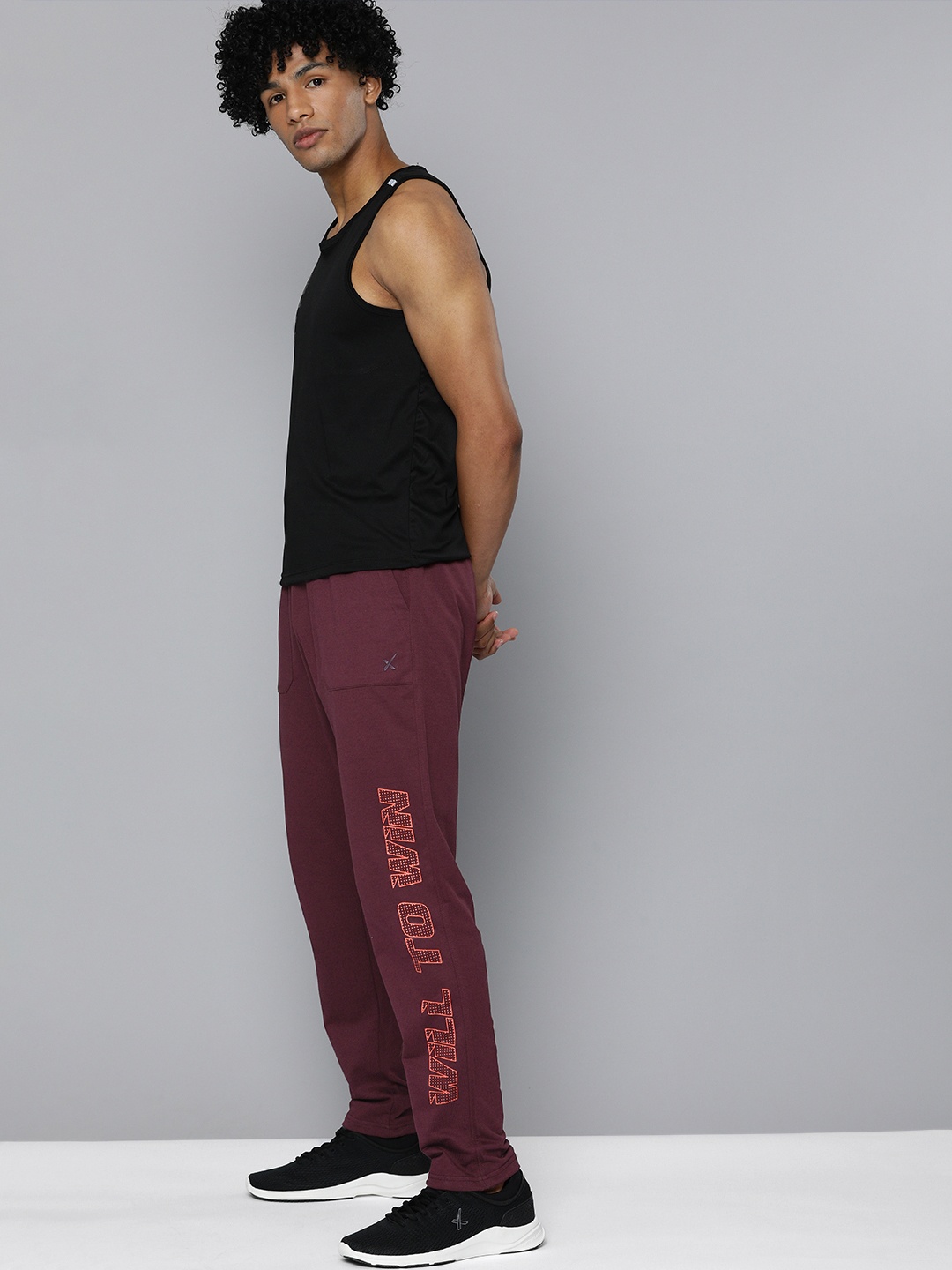 

HRX By Hrithik Roshan Men Fig Typographic Regular Fit Mid-Rise Bio-Wash Lifestyle Track Pants, Burgundy