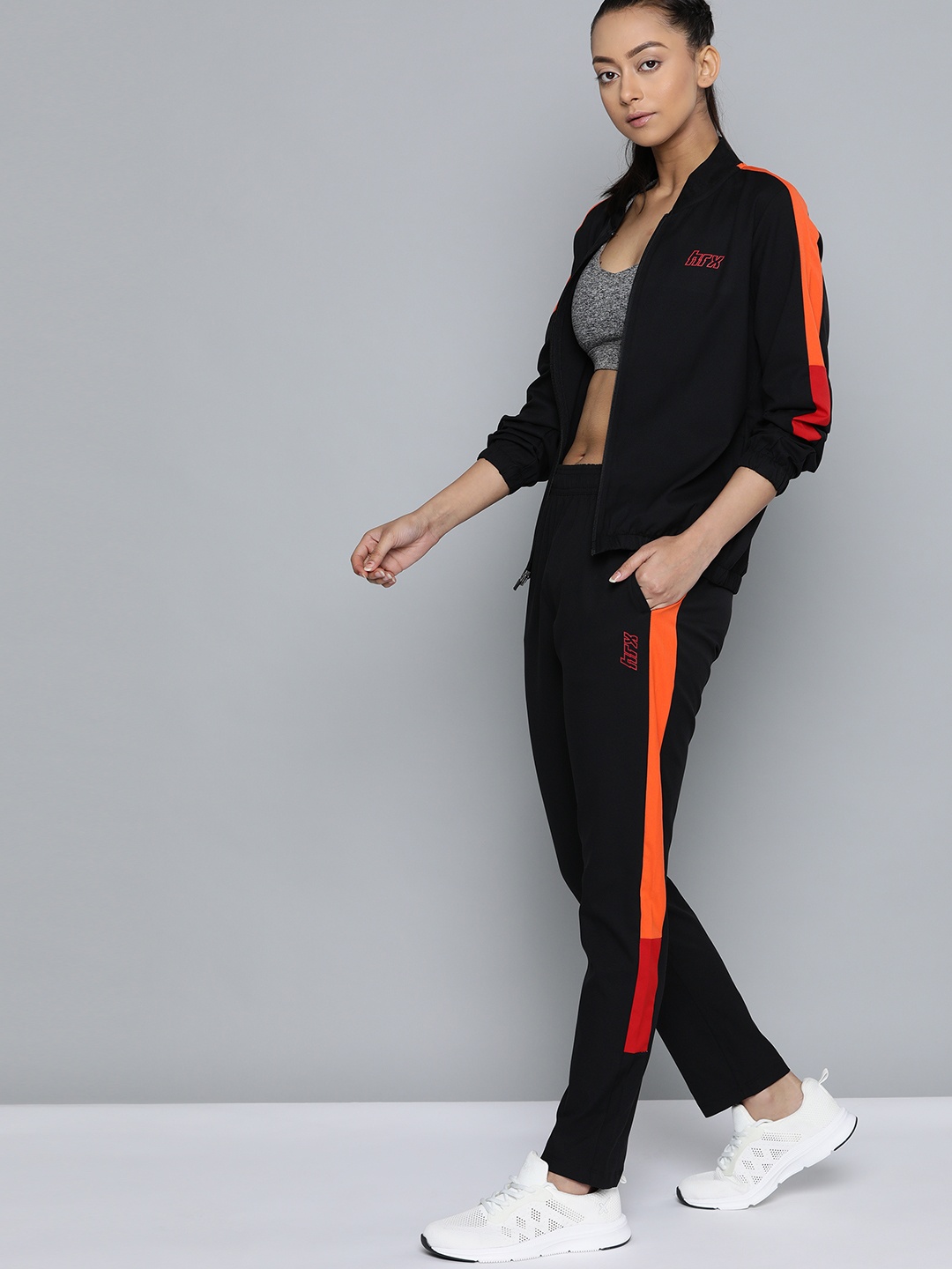 

HRX By Hrithik Roshan Women Jet Black Colourblock Regular Fit Rapid-Dry Anti-Static Antimicrobial Lifestyle Tracksuits