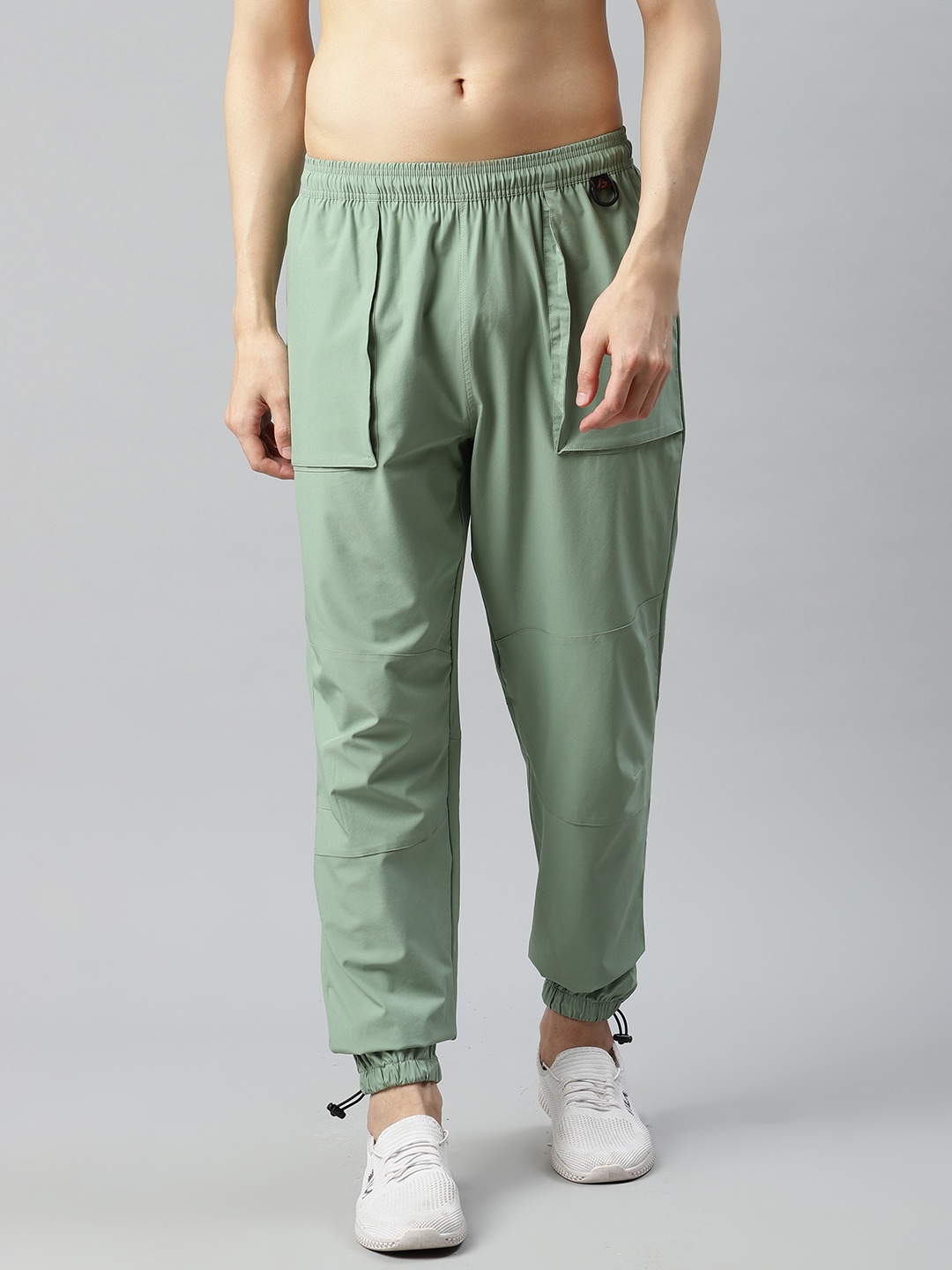 

HRX By Hrithik Roshan Men Green Solid Slim Fit Mid-Rise Rapid-Dry Outdoor Joggers