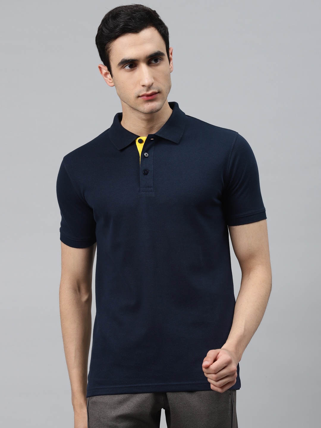 

Alcis Men Navy Blue Slim Fit Solid Polo Collar T-shirt