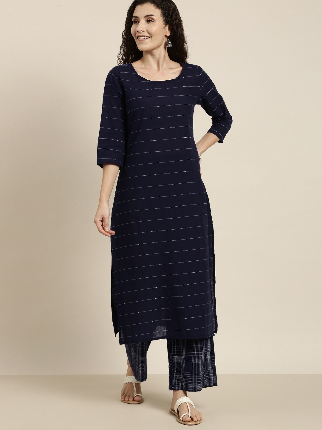 

Vishudh Women Navy Blue Striped Kurta with Palazzo