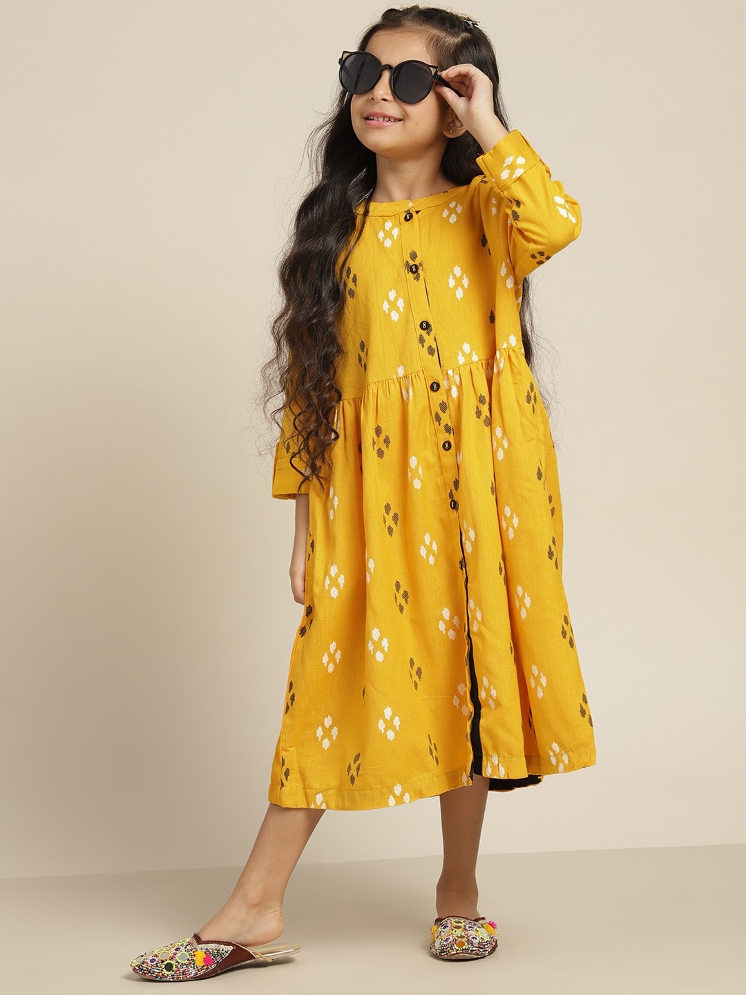 

Sangria Girls Mustard Yellow & Black Pure Cotton Geometric Print A-Line Dress