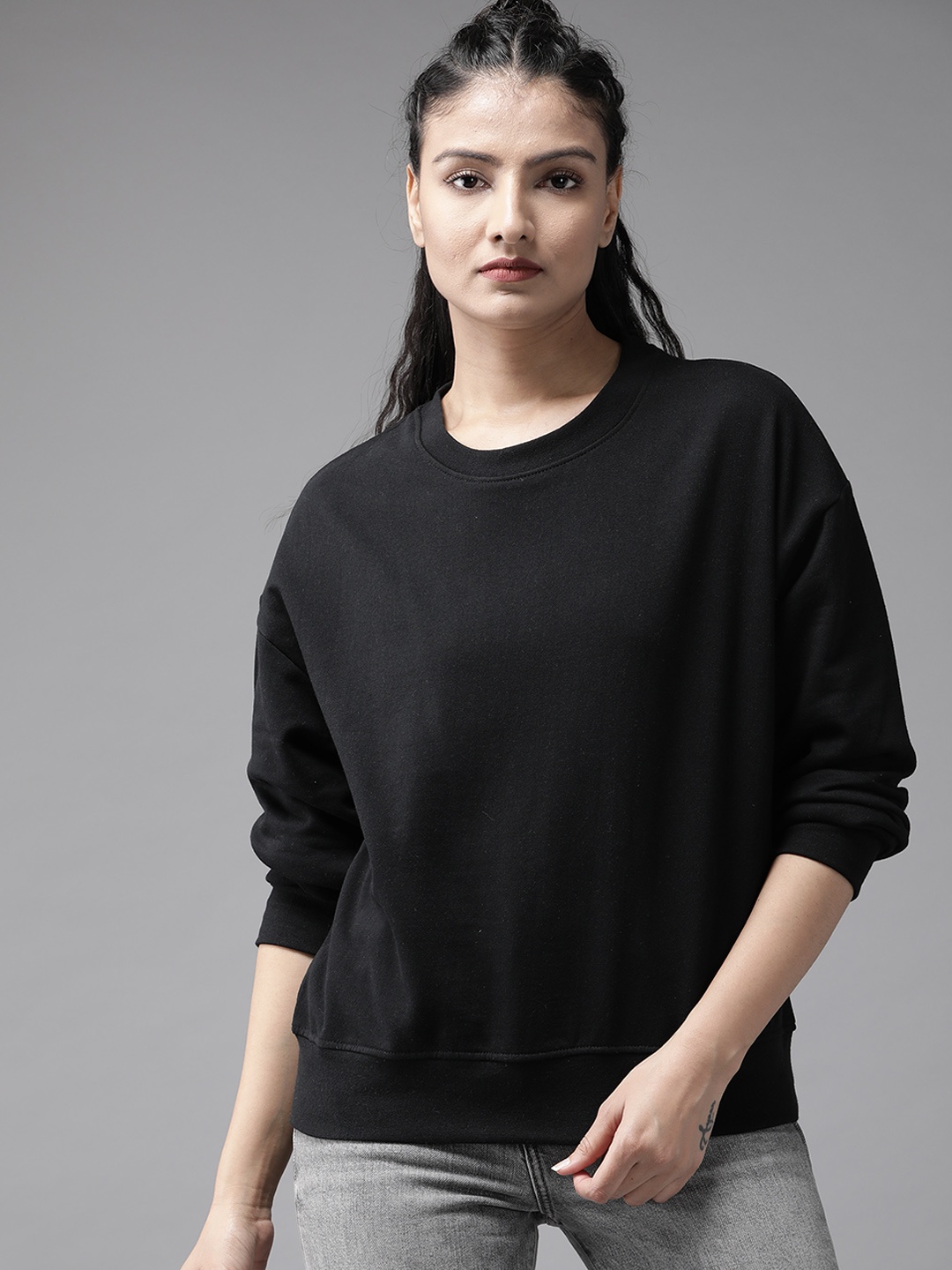 

The Roadster Lifestyle Co Women Black Solid Boxy Sweatshirt